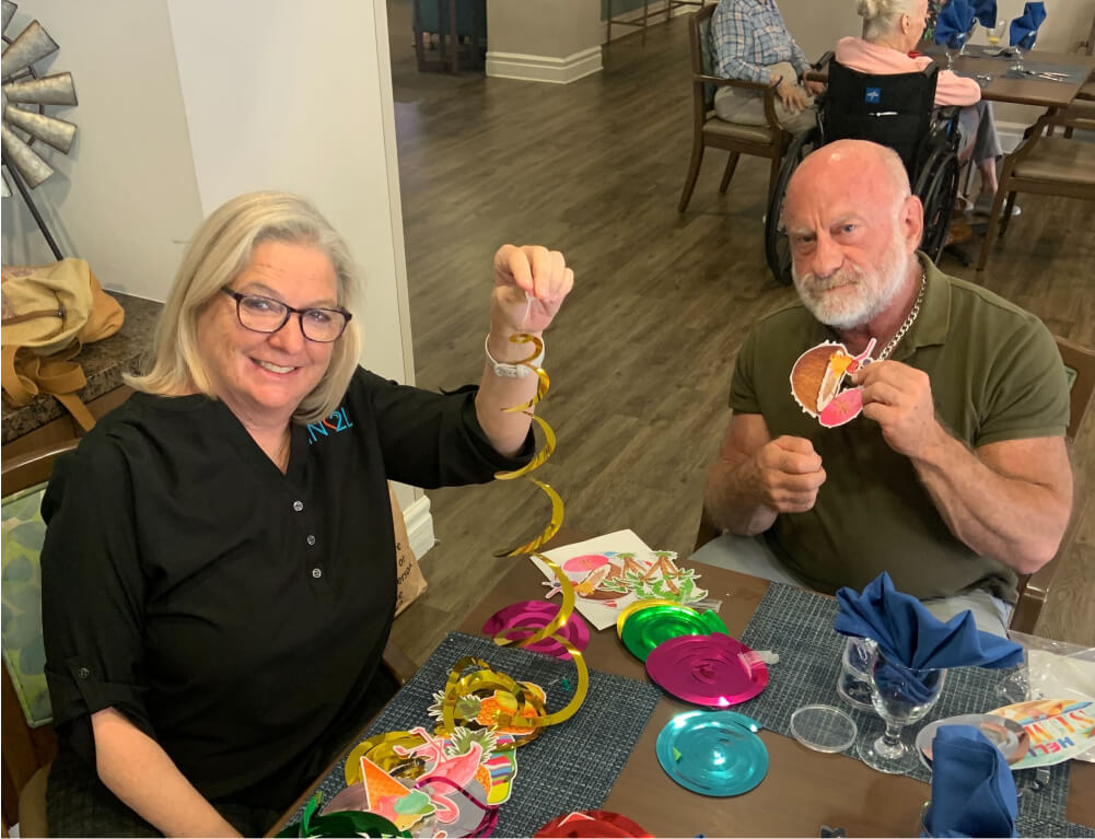 Two friends create with arts and crafts